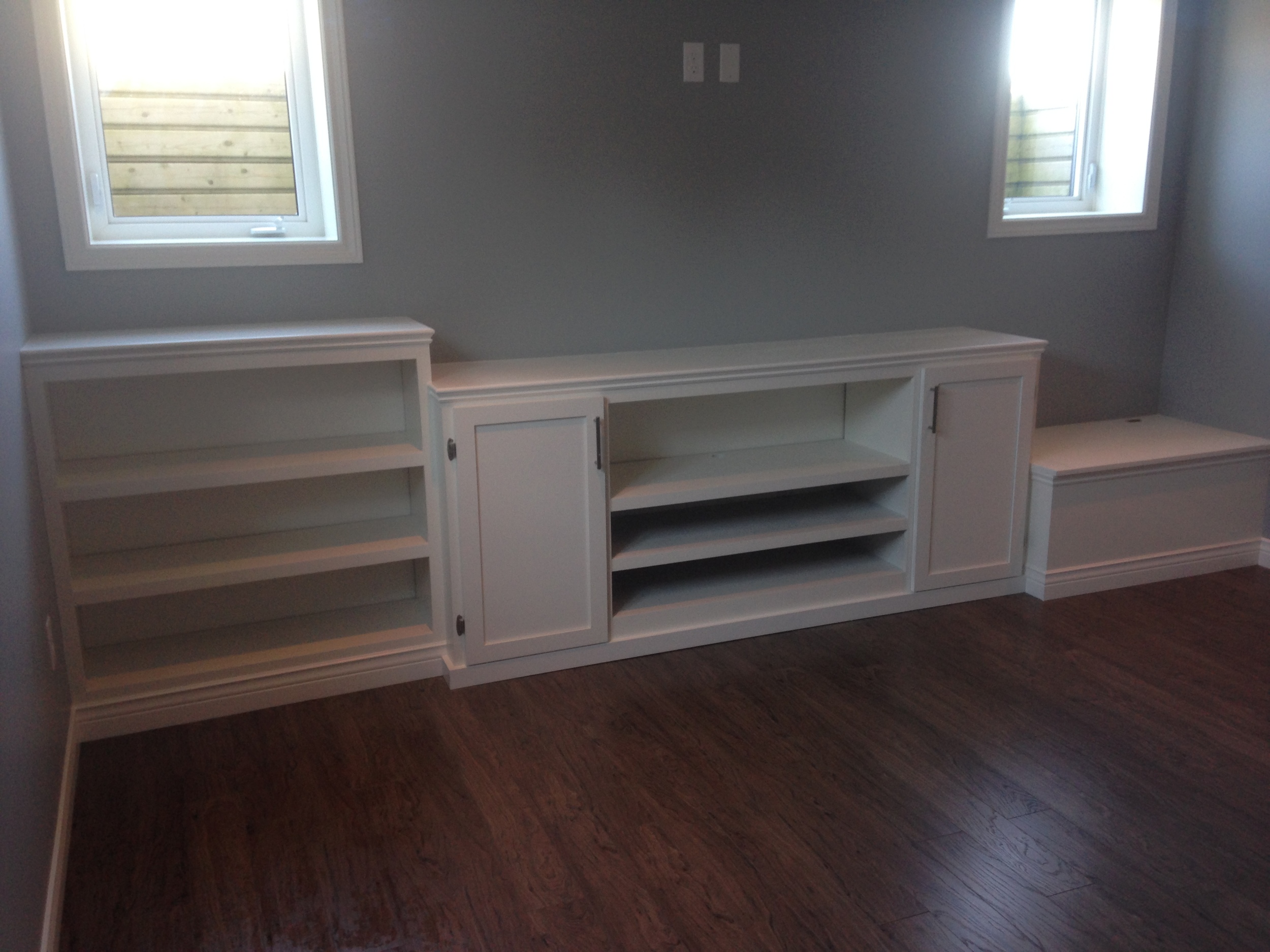 Custom media unit with shelves and bench storage