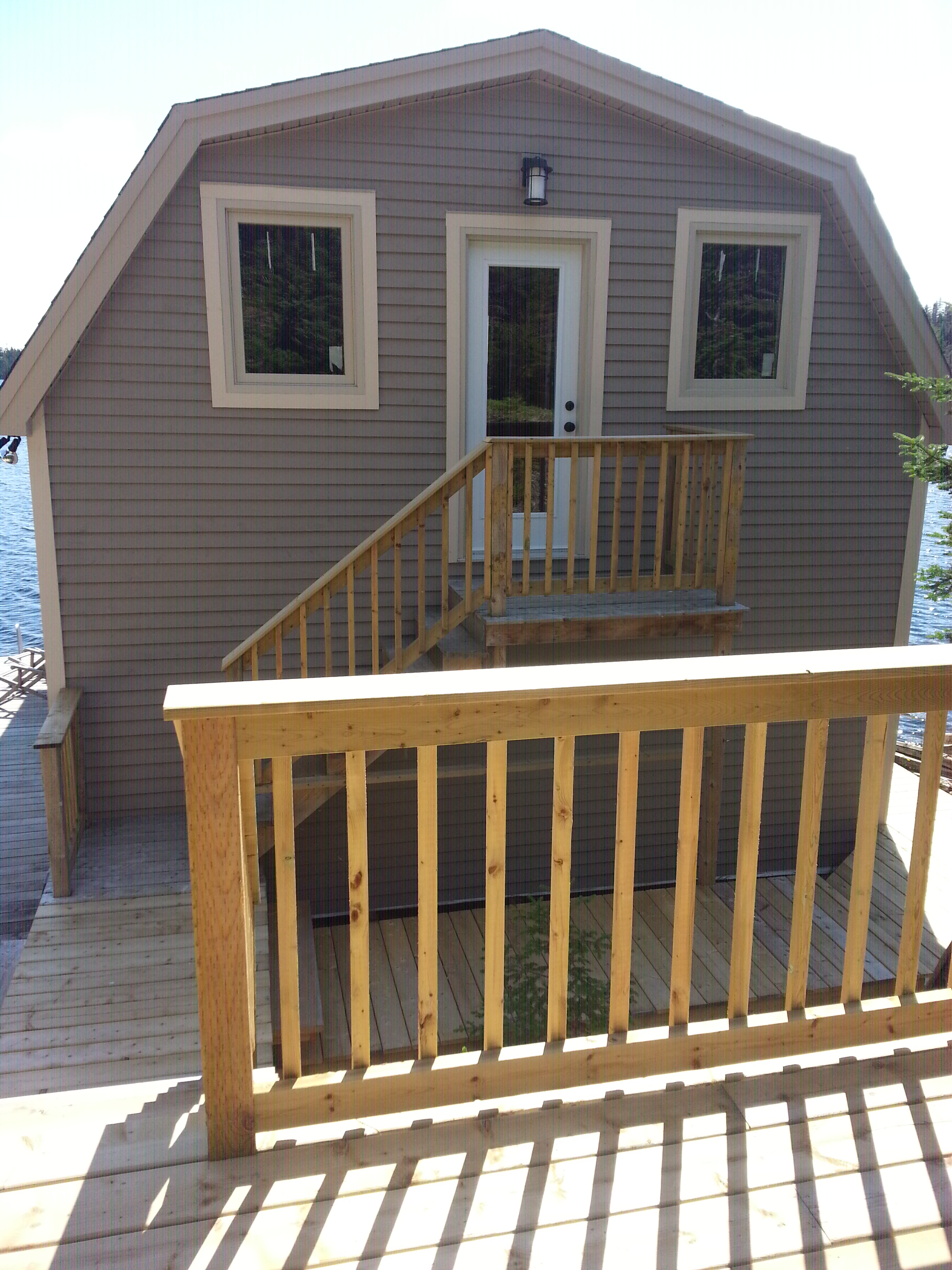 New spruce siding and cape cod trim with aluminum fascia