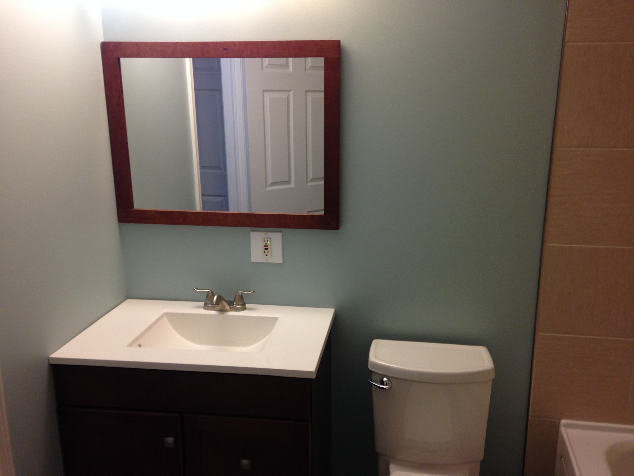 New mirror, vanity and toilet