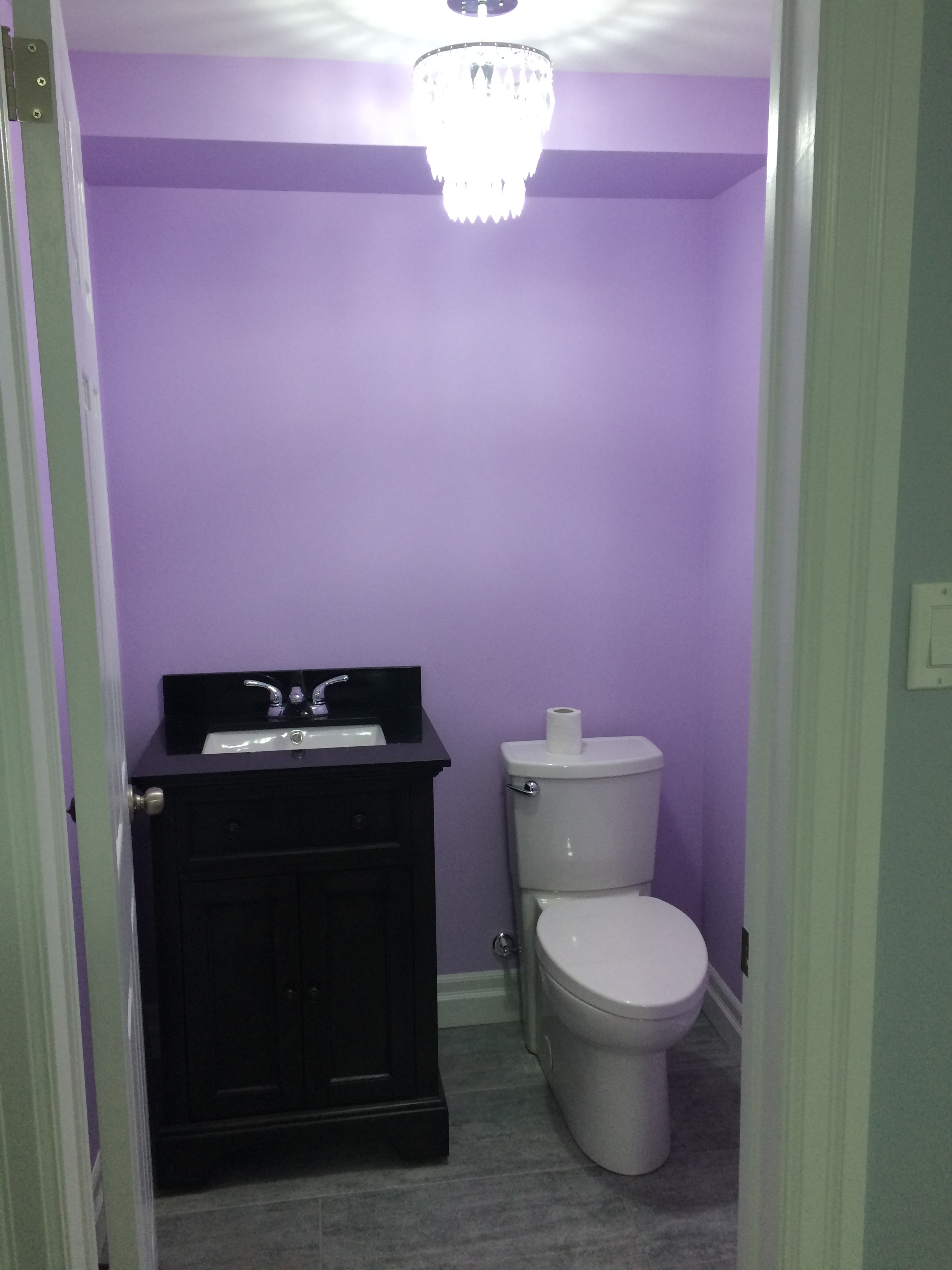 Bright half bath with jewel fixture