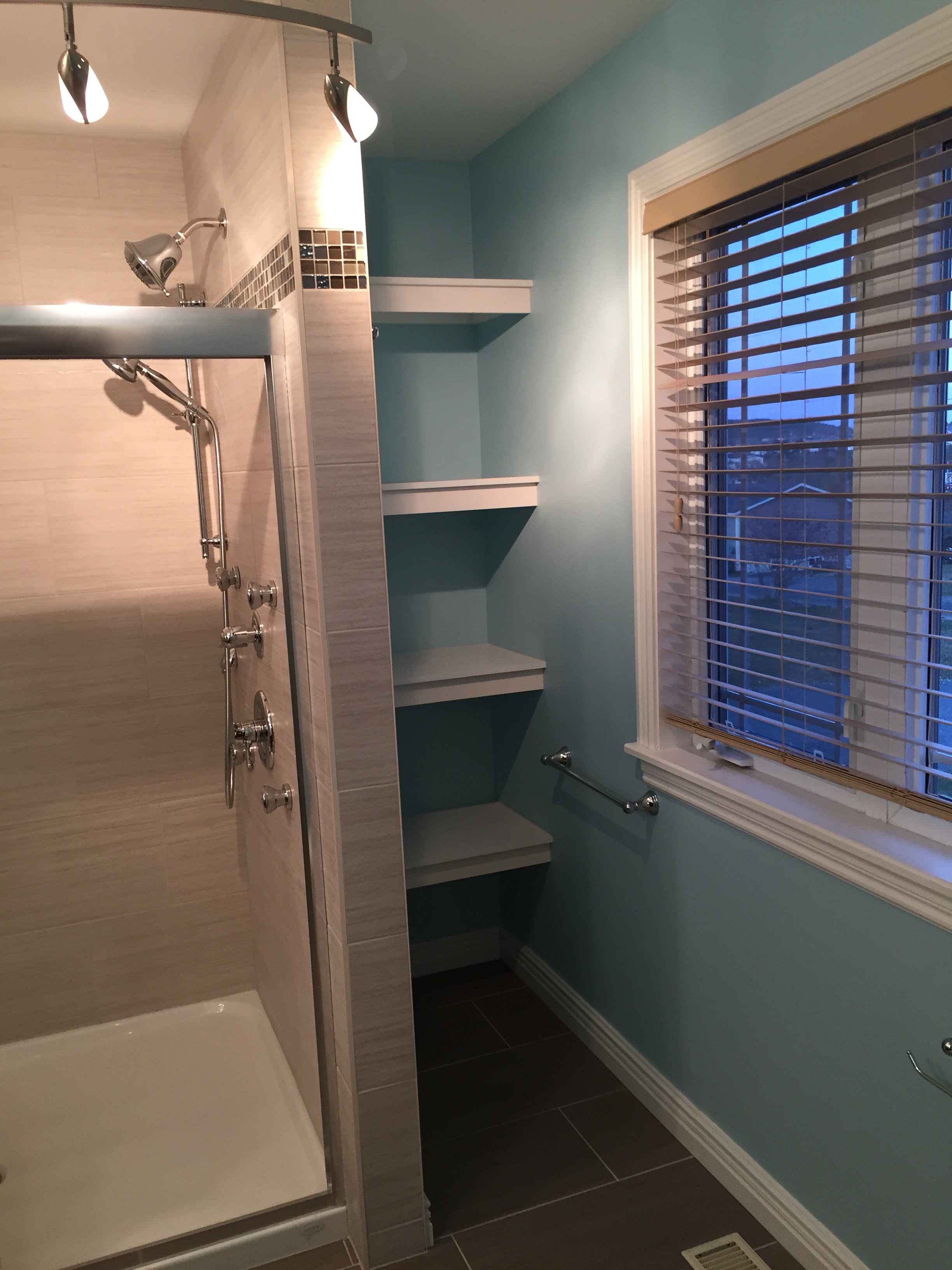 New tiled shower and storage space. 