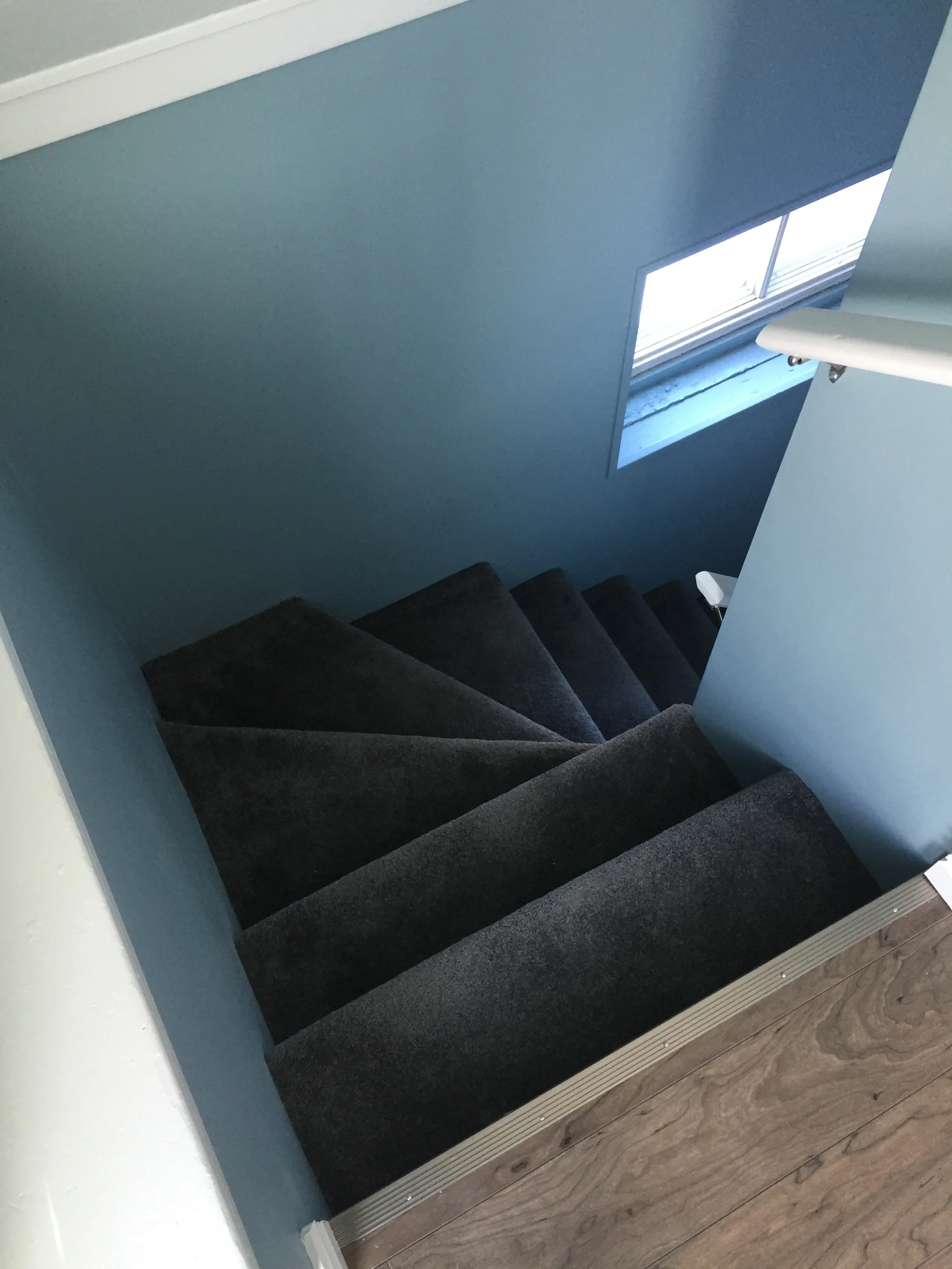 Stairs rebuilt as winders, making for a safe and comfortable step height. 