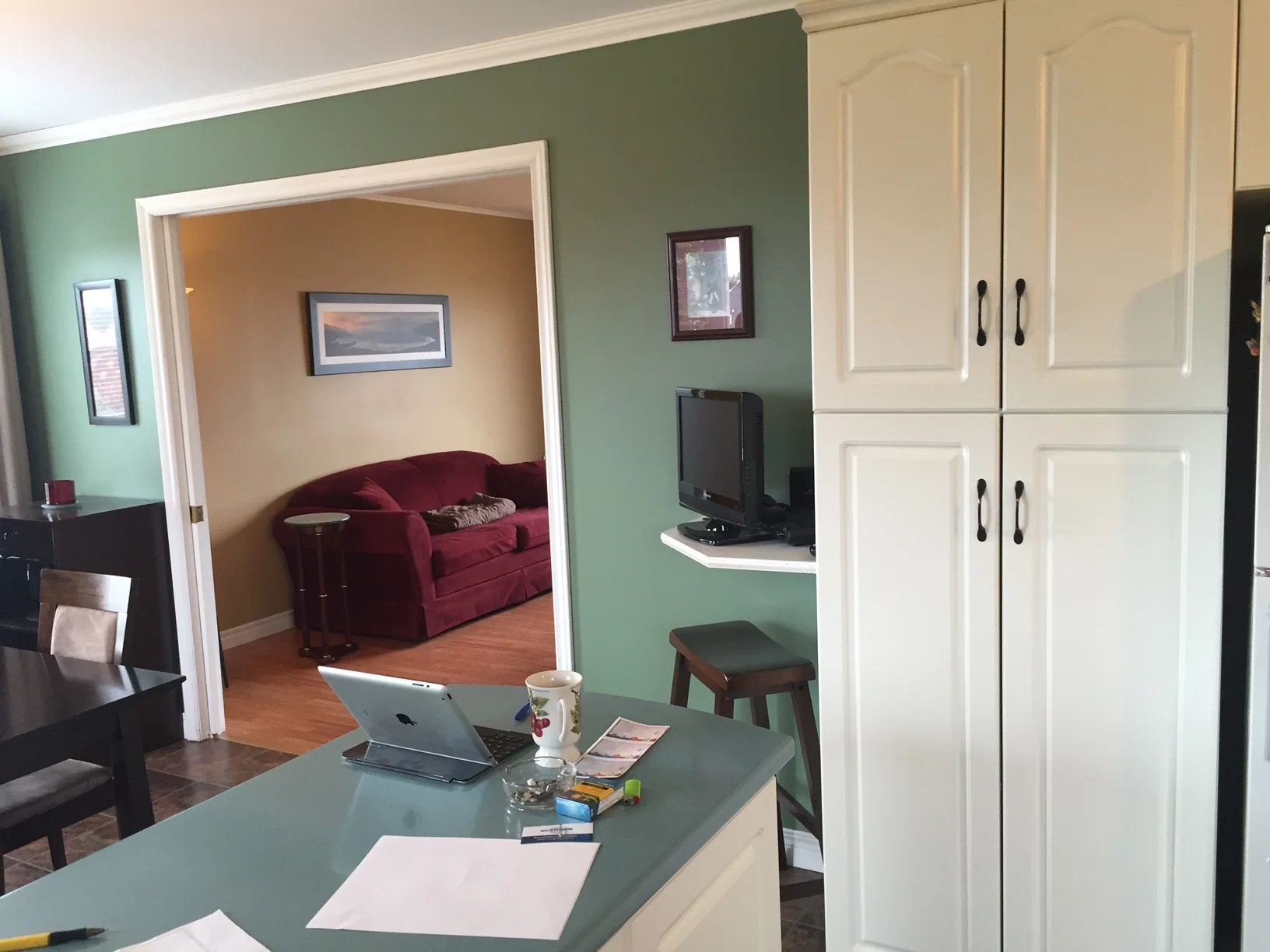 Before - Dining area and doorway to living room