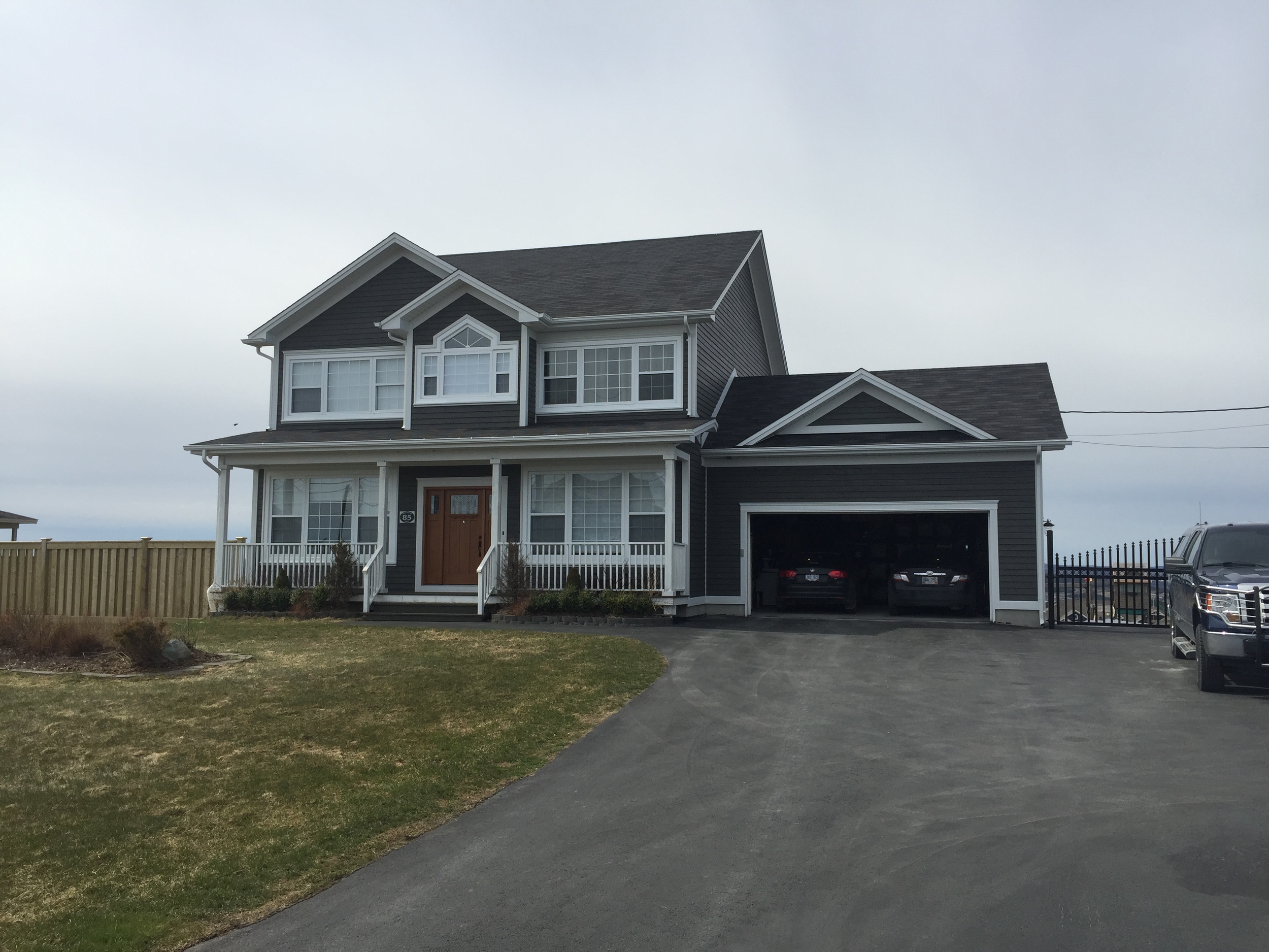 Complete exterior renovation with vinyl siding and trims replaced with Cape Cod. 