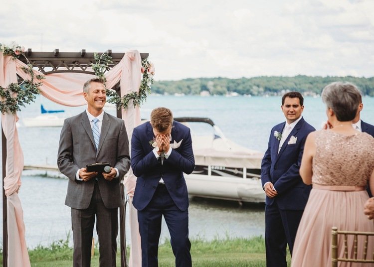 Groom-Seeing-bride-by-lake.jpg