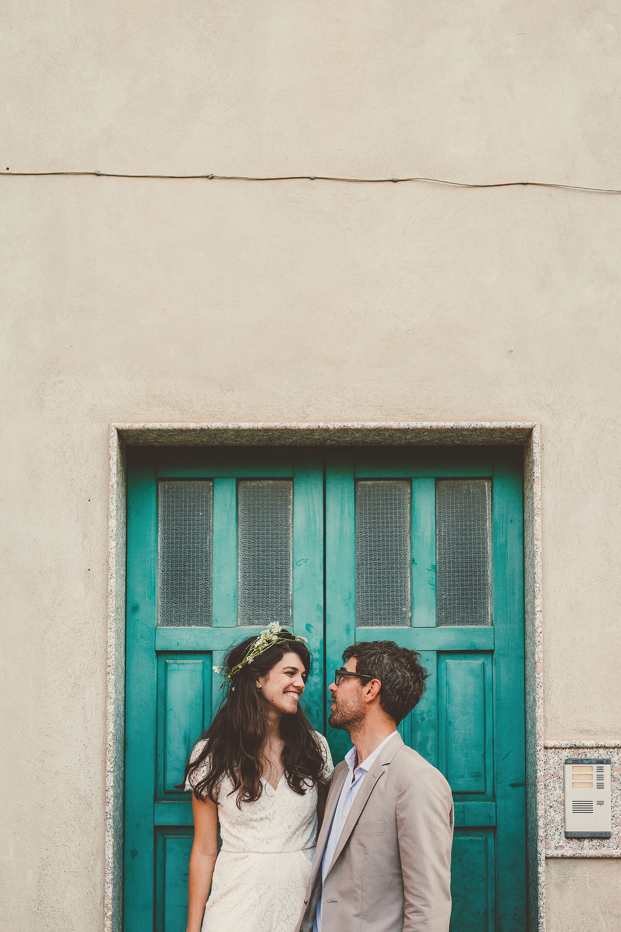 Wedding Photography Carly Romeo Photography Richmond VA Aidone Sicily Italy Teal Door Couple Portrait Wreath 