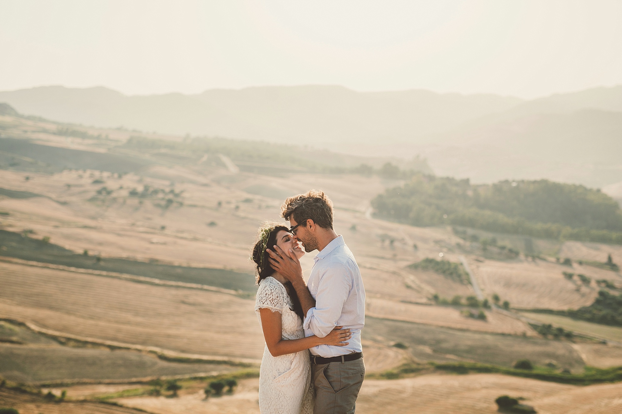 Wedding Photography Carly Romeo Photography Richmond VA Aidone Sicily Italy Couple Kiss Landscape Backdrop Beautiful Elopement