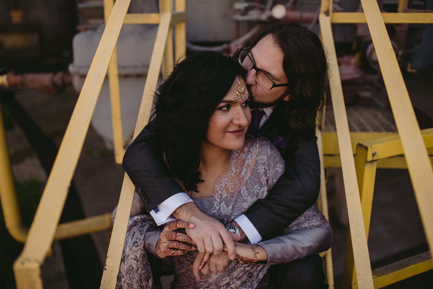 Feminist Wedding Photography Carly Romeo Photography Richmond VA Packistani Packistan Interracial Interfaith Kiss Henna Punk Purple Industrial Stairs