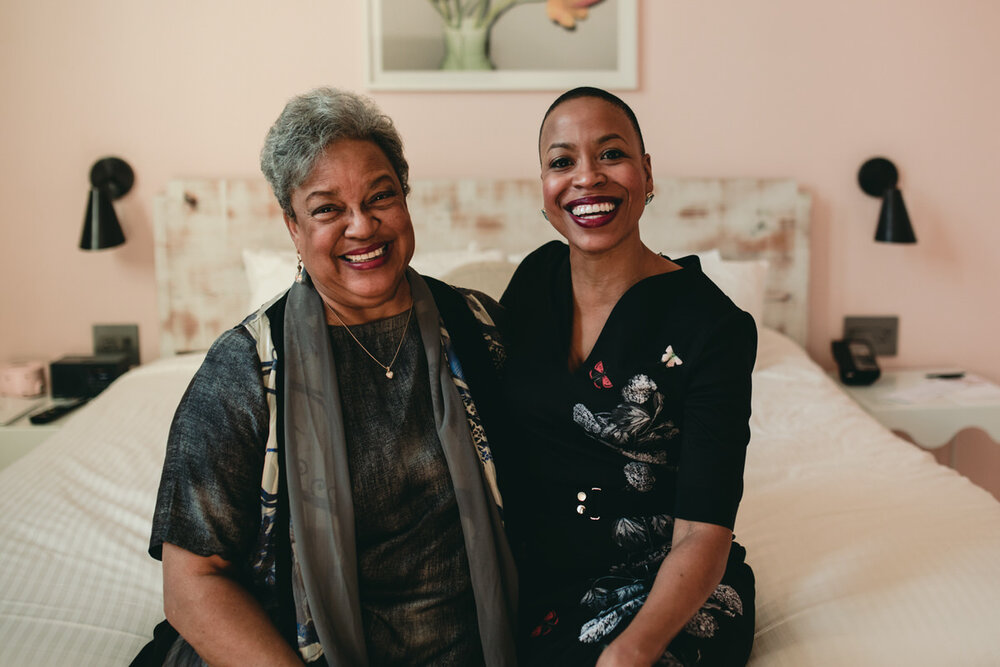 Black mother and daughter smiling at Quirk Hotel Carly Romeo Richmond wedding photography