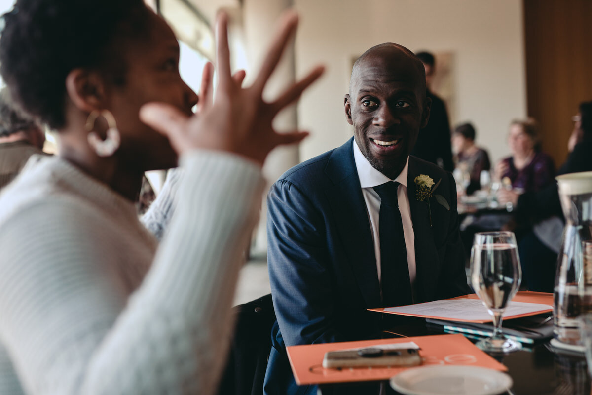 Black man smiling after elopement wedding at the Museum of Fine Arts in Richmond VA Carly Romeo