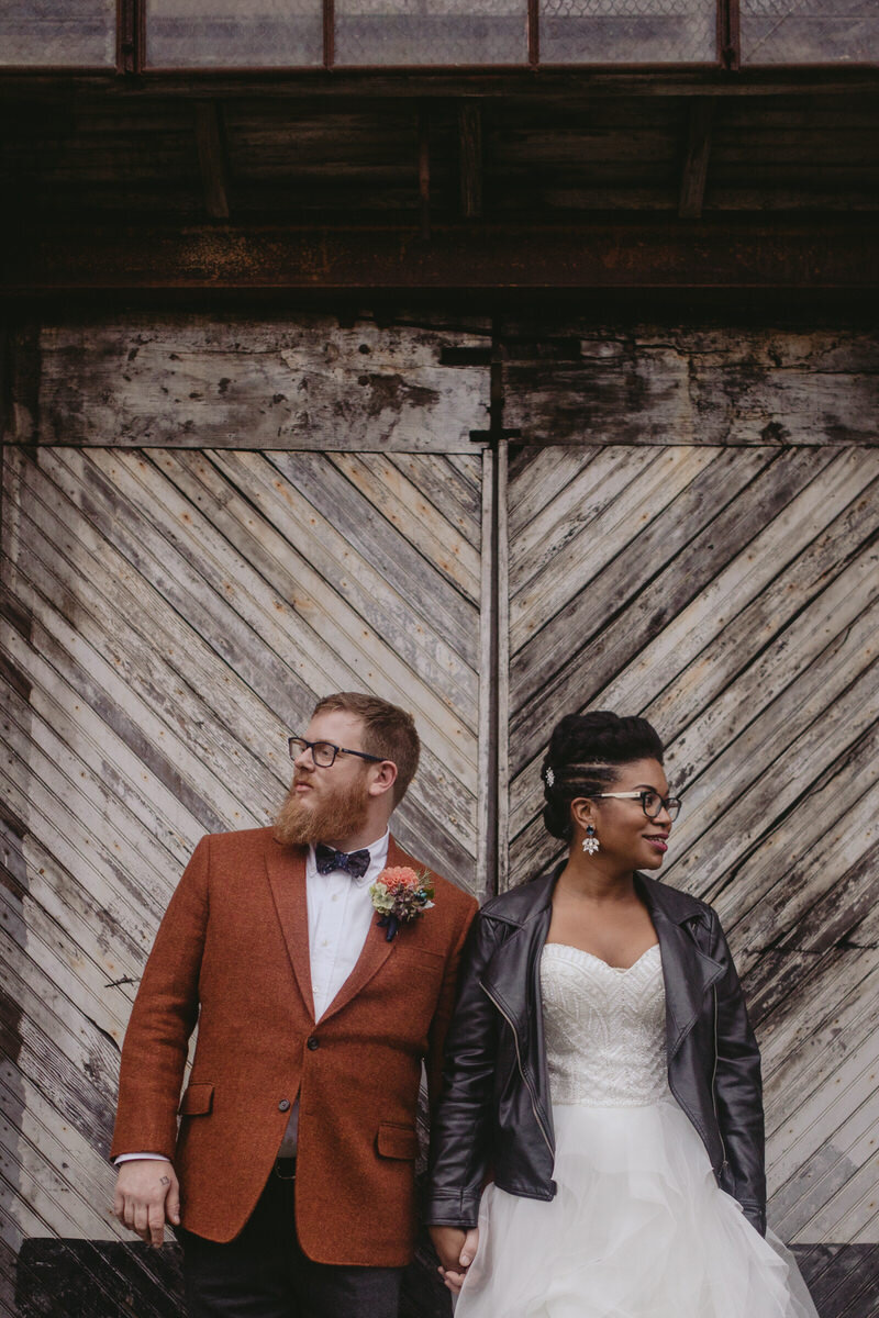 Mixed race newly wed couple in Balitmore MD feminist wedding photography Carly Romeo