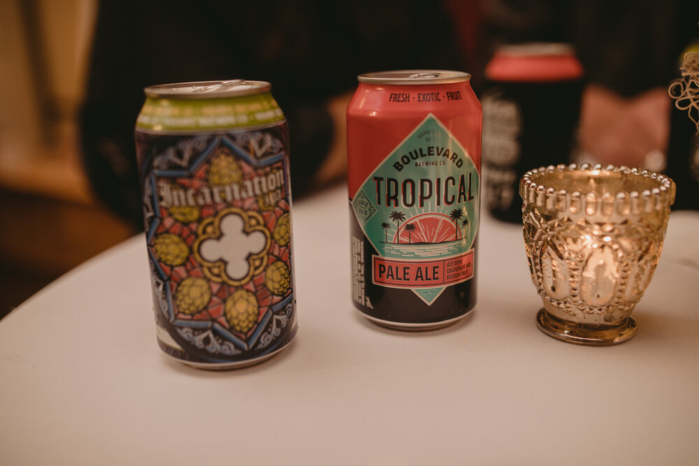 Beer cans on wedding reception table at Corradetti Glassblowing Baltimore MD Carly Romeo