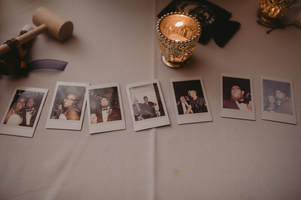 Polaroid photos at wedding reception in Corradetti Studio Baltimore Maryland Carly Romeo &amp; CO.