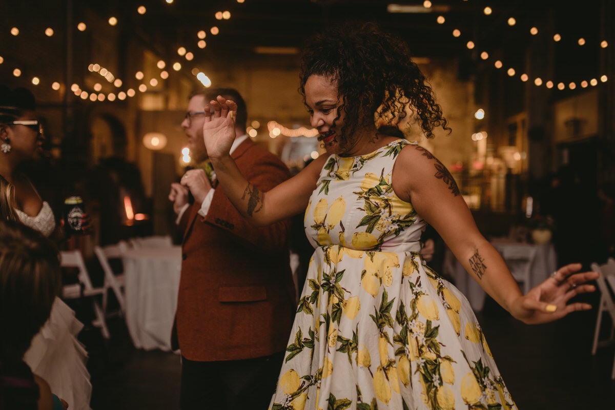 Friends dancing at wedding reception at Corradetti Studio in Baltimore Maryland Carly Romeo
