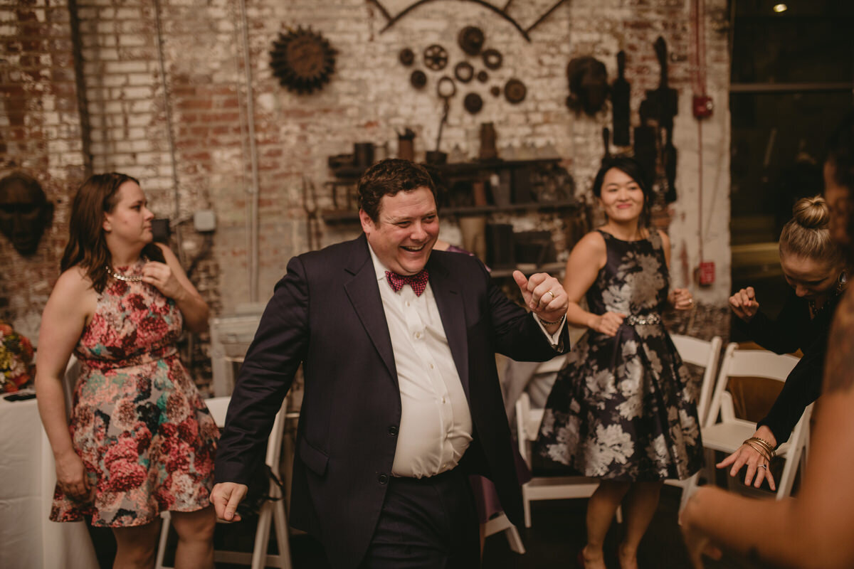 Family guests dancing at reception in Corradetti Baltimore MD Wedding Carly Romeo