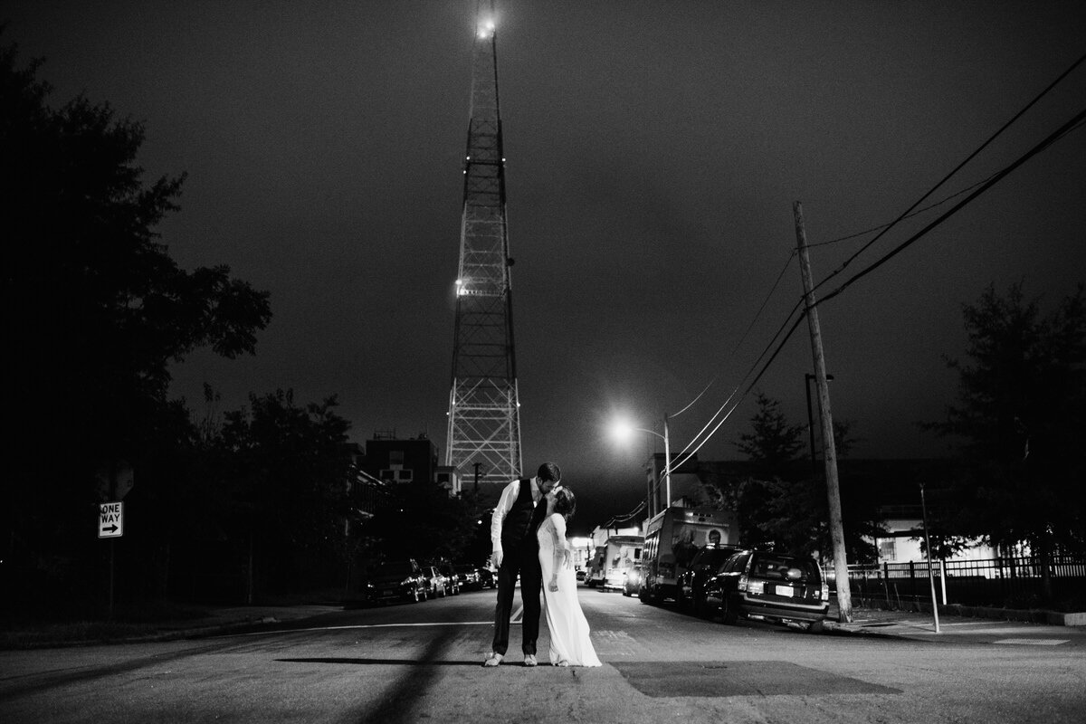 Couple kissing in street in Scotts Addition Richmond Virginia Carly Romeo wedding photography