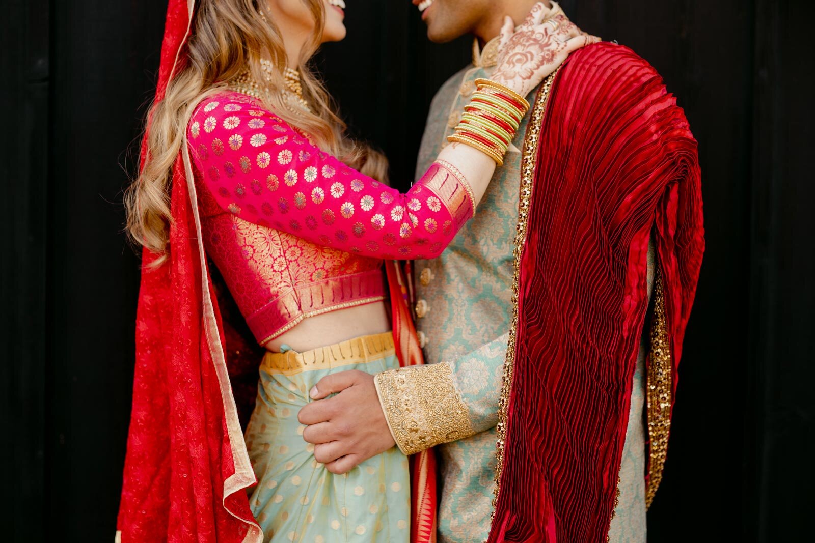 Couple wearing traditional indian wedding dress at Dover Hall Richmond VA Carly Romeo photography