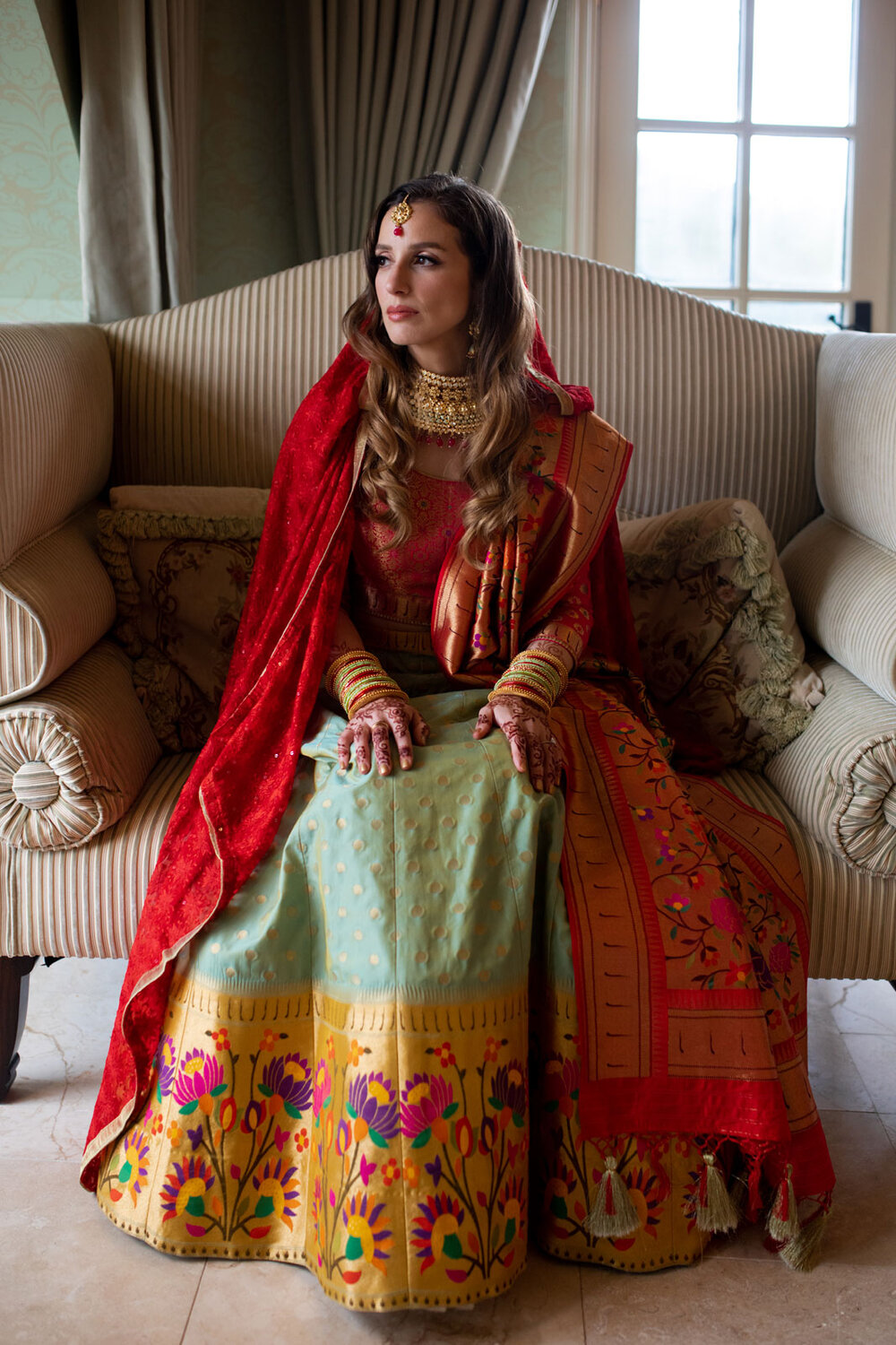 Bride wearing Maang Tikka and traditional indian wedding formal wear at Dover Hall Richmond VA Carly Romeo and Co.