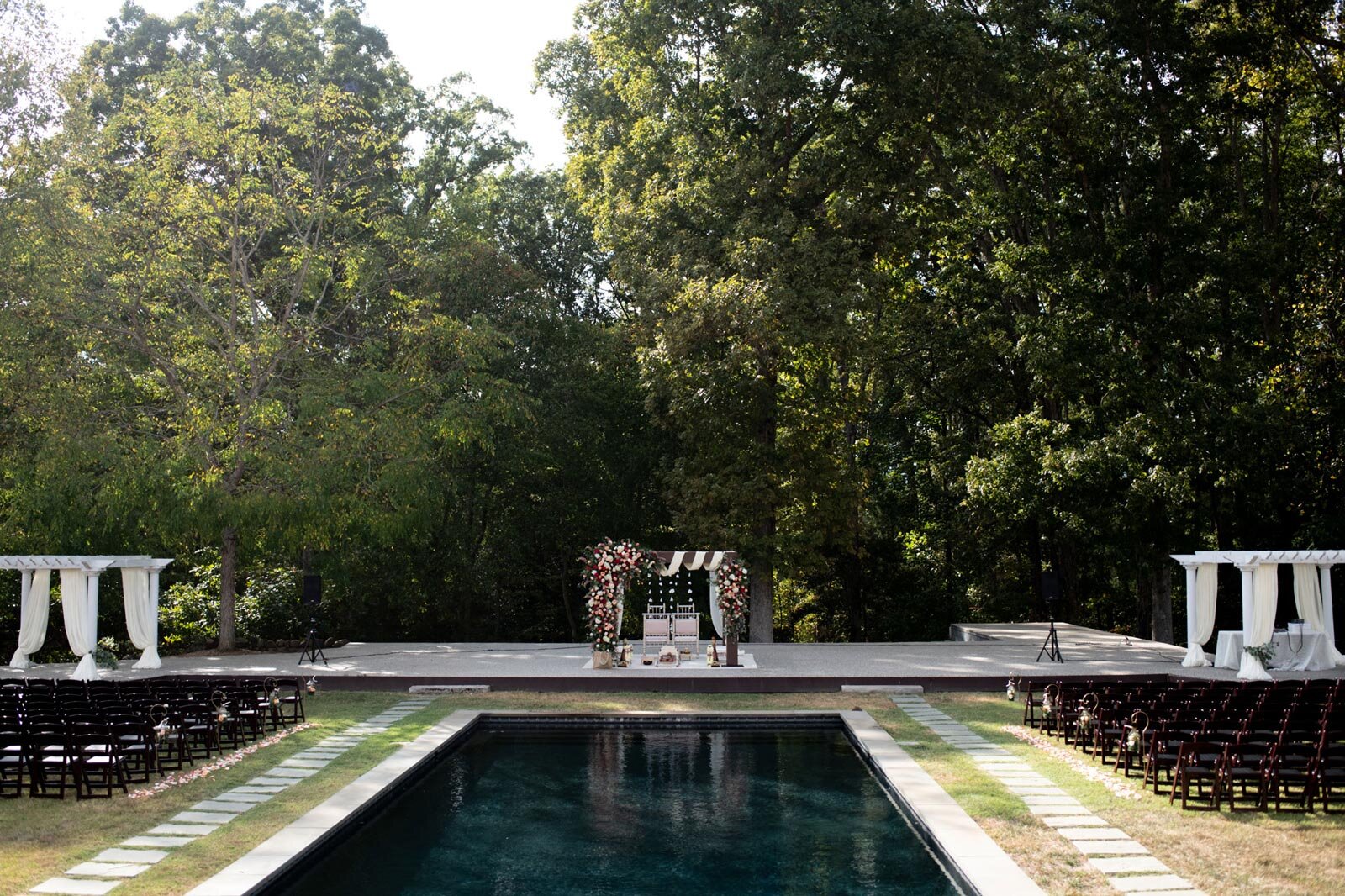 Indian wedding ceremony set up by pond at Dover Hall Richmond VA Carly Romeo photography