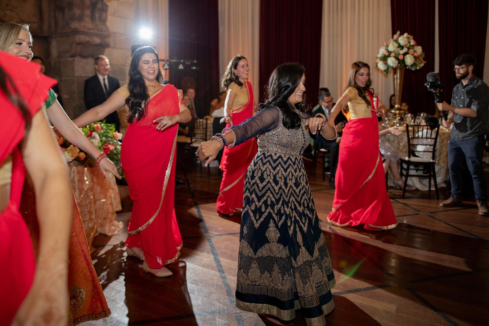 Indian bridesmaids dance at wedding reception Dover Hall Richmond VA Carly Romeo and Co.