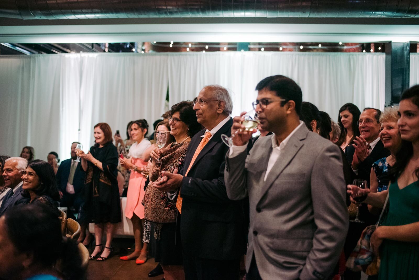 Guests watching wedding ceremony at Pittsburgh Opera Pennsylvania Carly Romeo photography