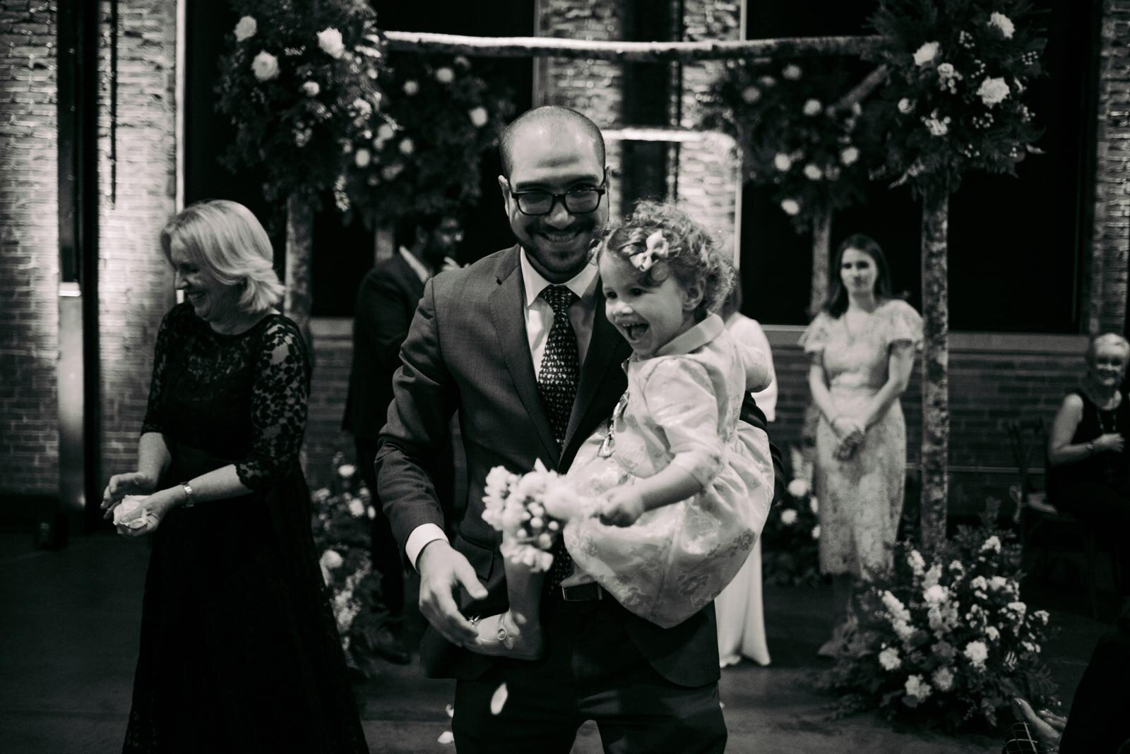 Happy flower girl with father at Pittsburgh Opera PA Carly Romeo wedding photography