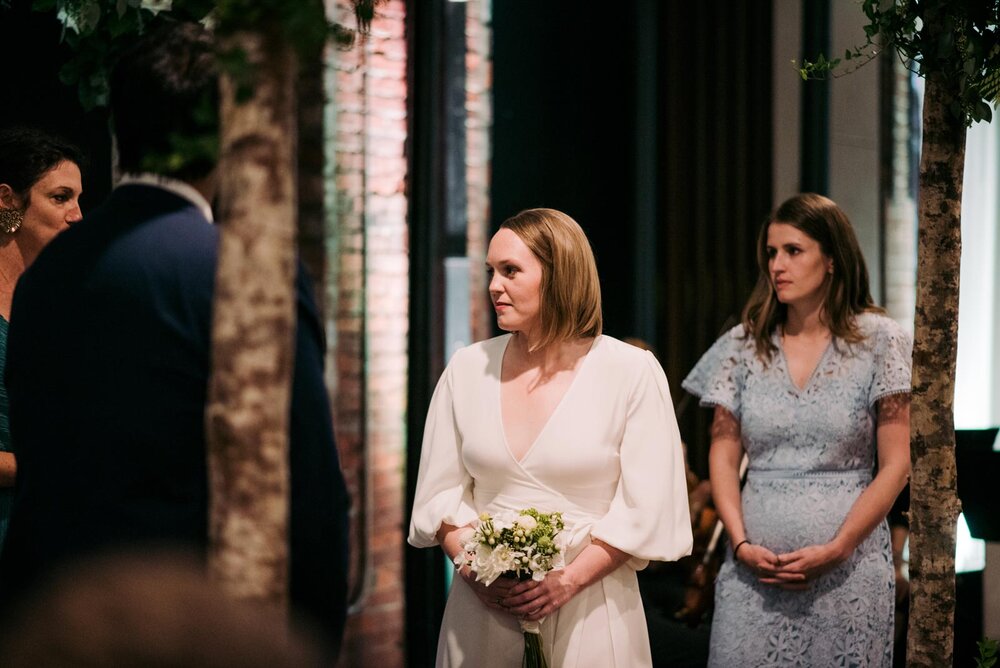 Bride during wedding ceremony at Pittsburgh Opera PA Carly Romeo and Co.