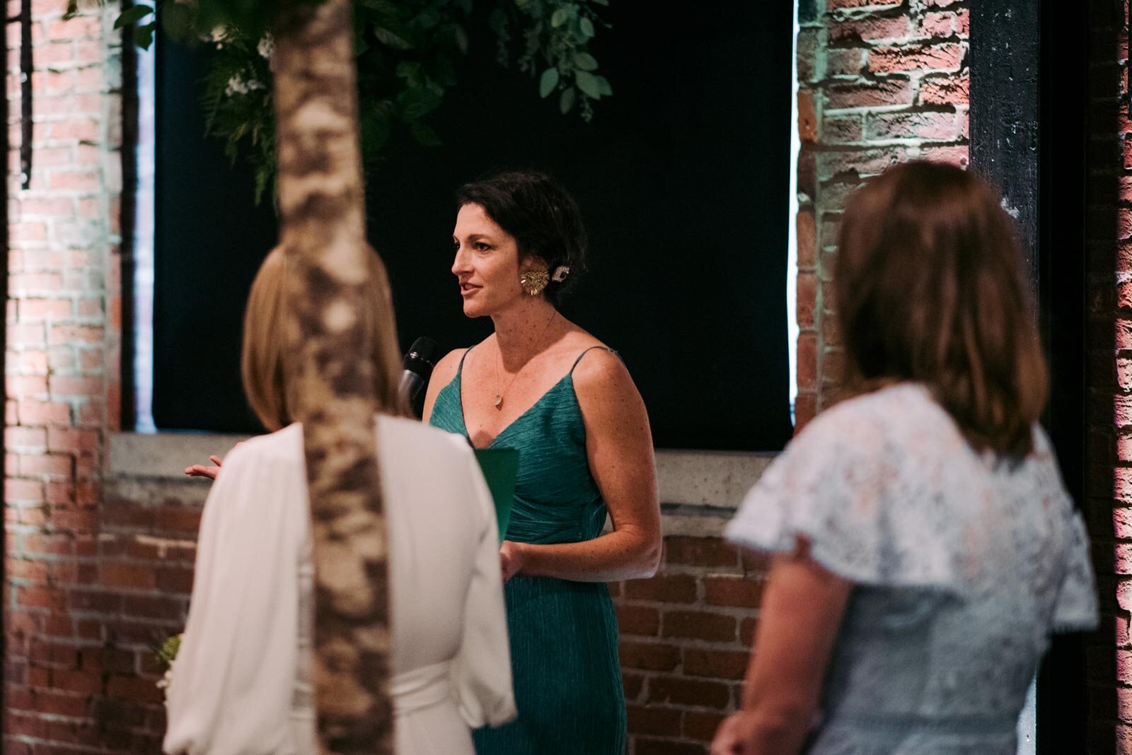 Officiant during wedding ceremony at Pittsburgh Opera PA Carly Romeo &amp; Co.