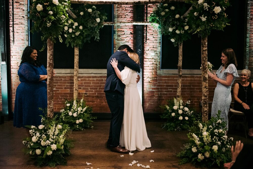 Bride and groom kissing at wedding ceremony in Pittsburgh Opera PA Carly Romeo &amp; Co.