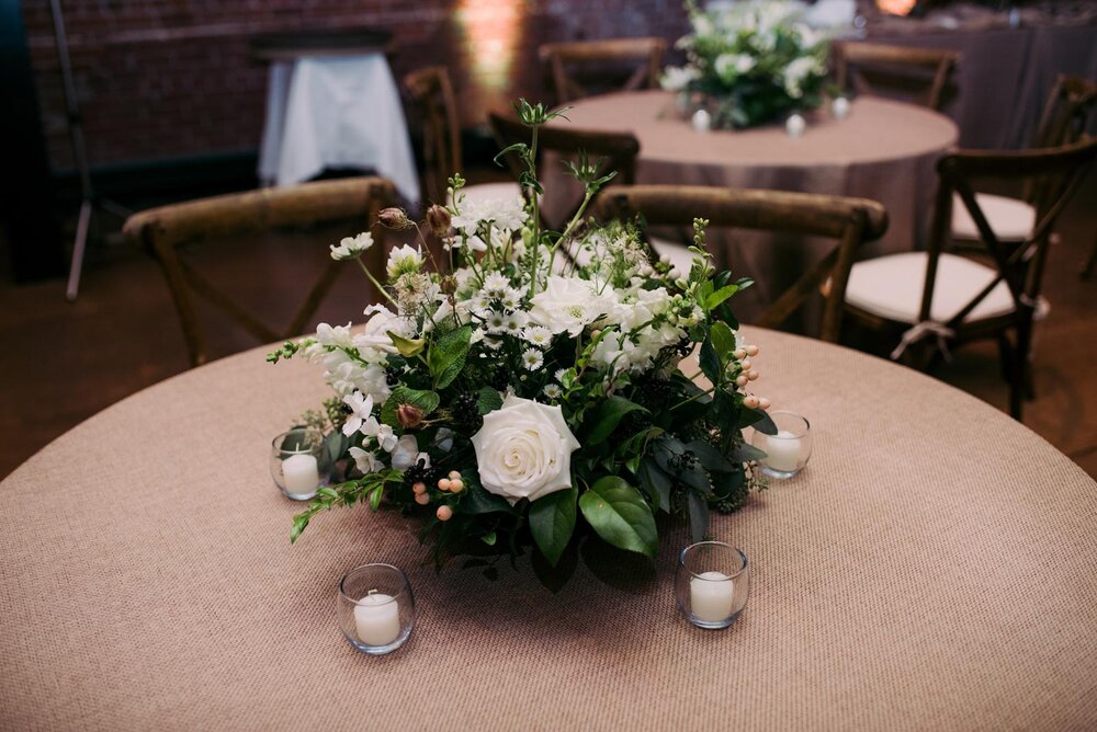 Green and white floral centerpiece at Pittsburgh Opera House PA Carly Romeo and Co.