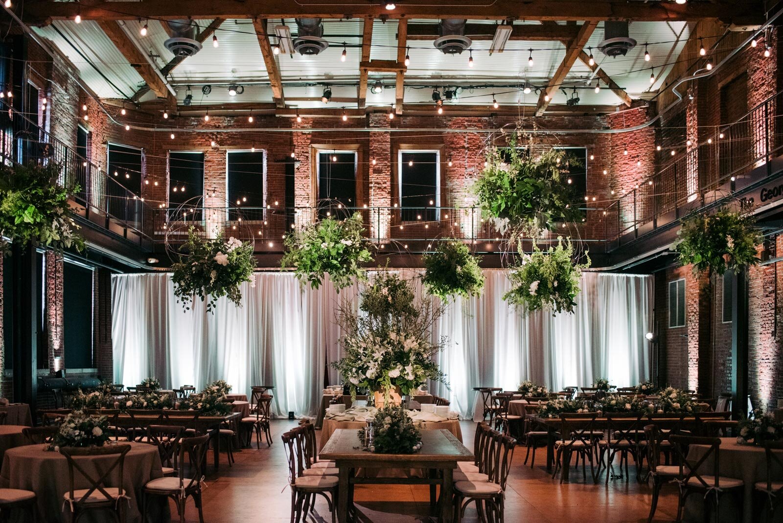 Pittsburgh Opera Space decorated with bouquets for wedding reception Pennsylvania Carly Romeo