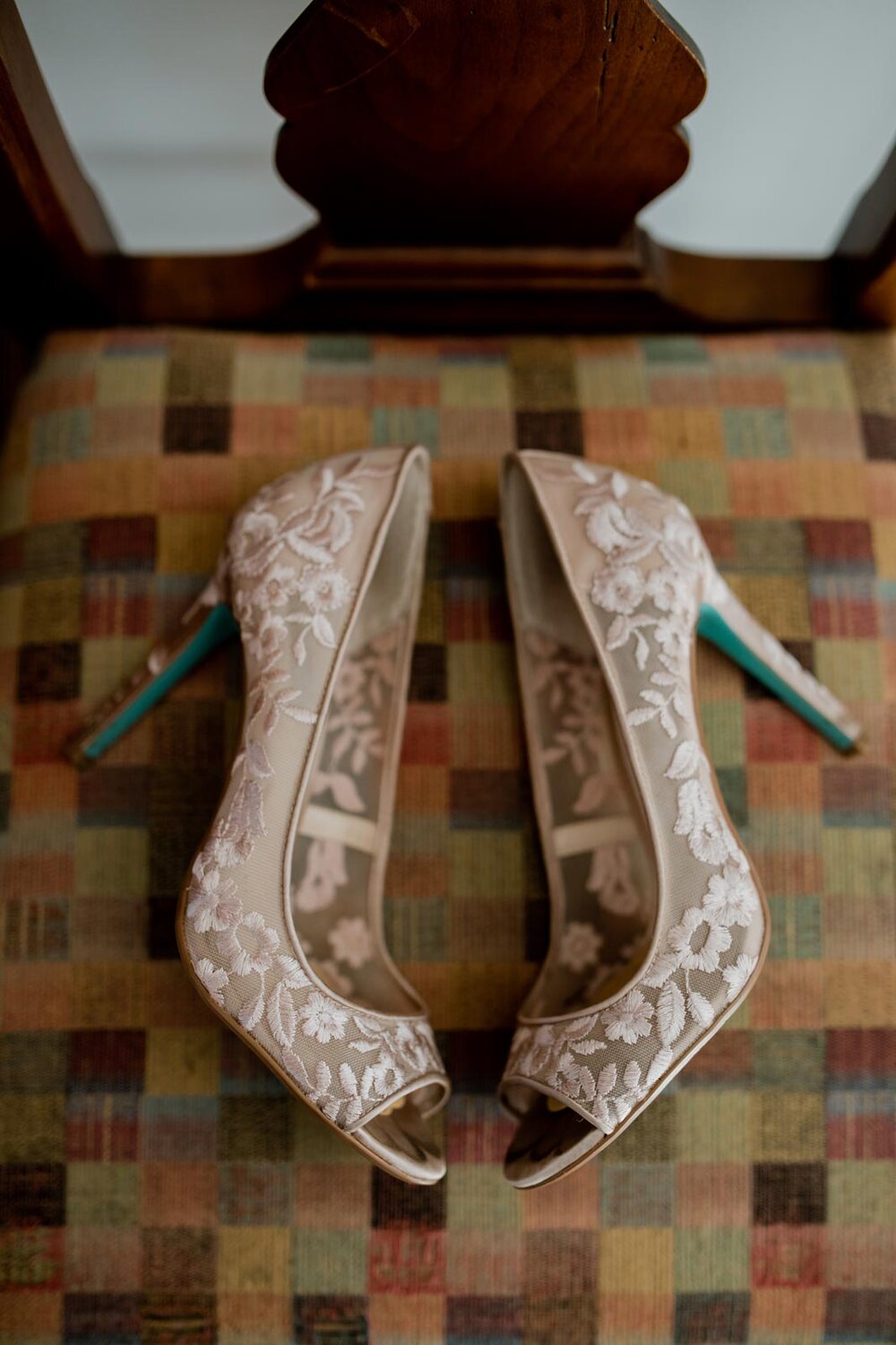 High heeled shoe with light pink floral embroidery and teal heals in Mendocino CA Carly Romeo + Co.
