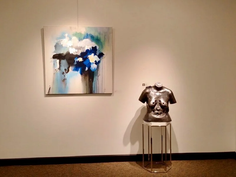 Painting by Sylvie Adams, with a bust by Tawny Skye.