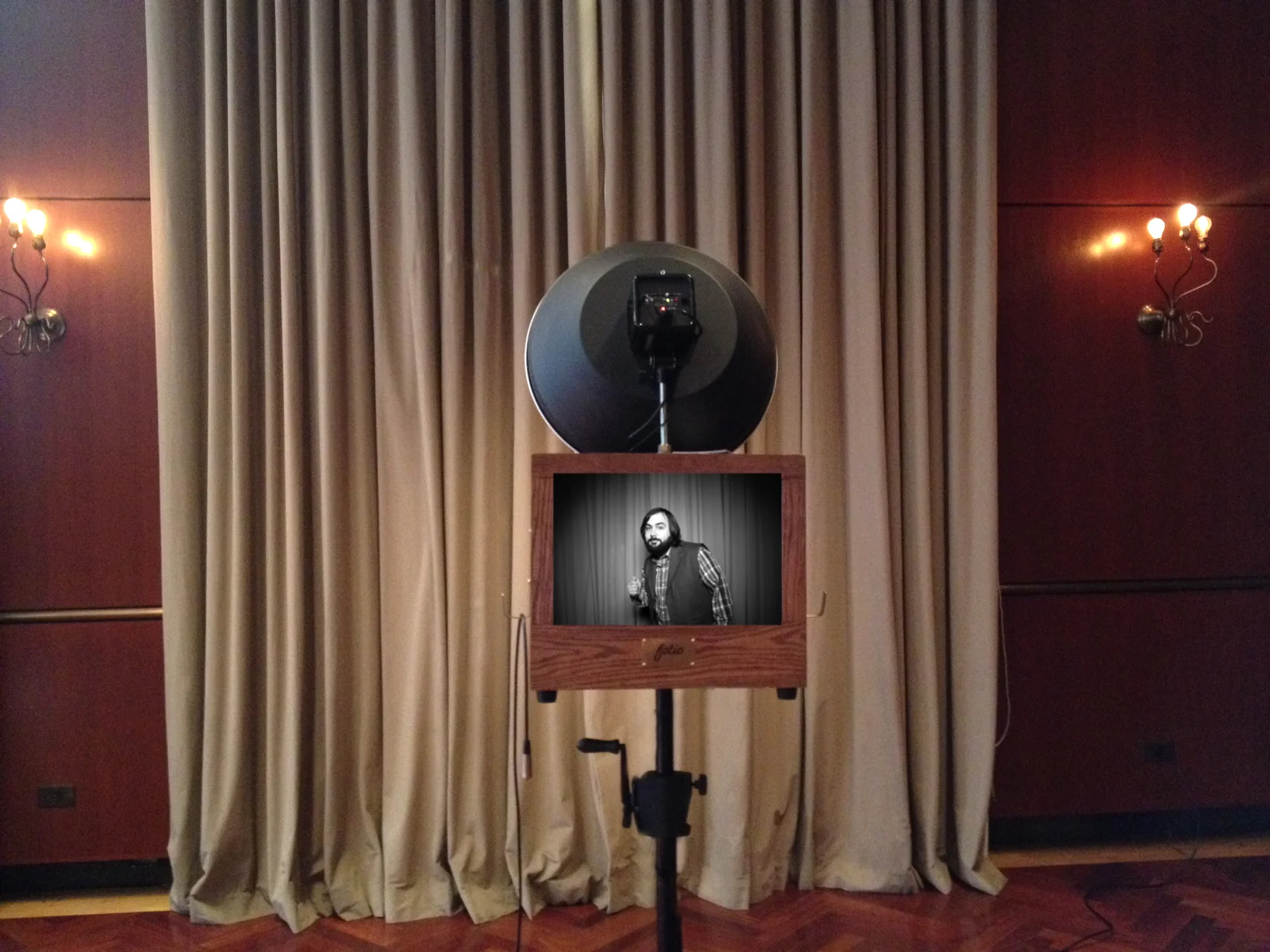 Fotio photo booth facing draped curtains in Ruggles Hall at Newberry Library.
