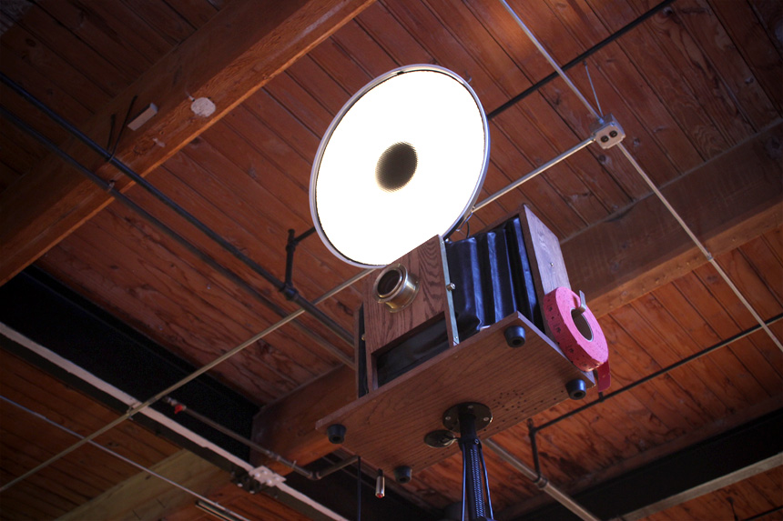 A picture of our vintage camera photo booth at Salvage One.
