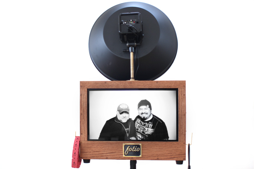 Fotio photo booth setup on the main floor at Kitchen Chicago using the white wall as a backdrop.