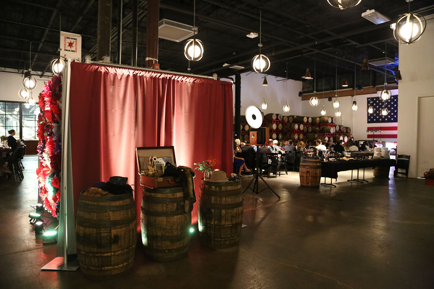 We like to use the barrels to hold the photo booth props!