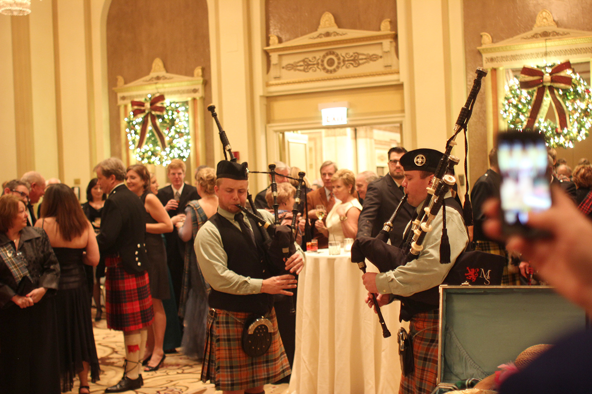A bagpipe band plays in the foyer space for the cocktail hour at the Palmer House. 