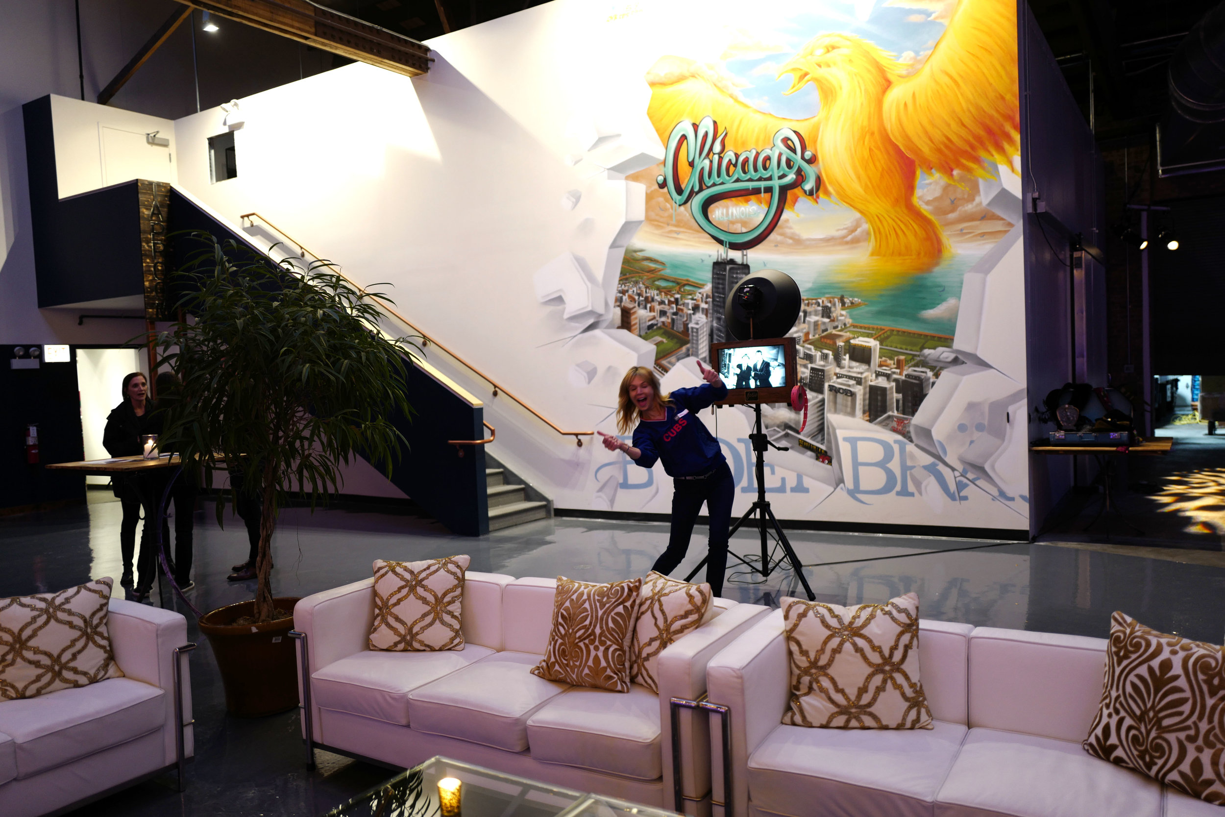 Loved the furniture provided by Art of Imagination along with the rotating artist mural we used as the photo booth backdrop. Astra from Venue Logic photo bombs my pic before guests arrive!