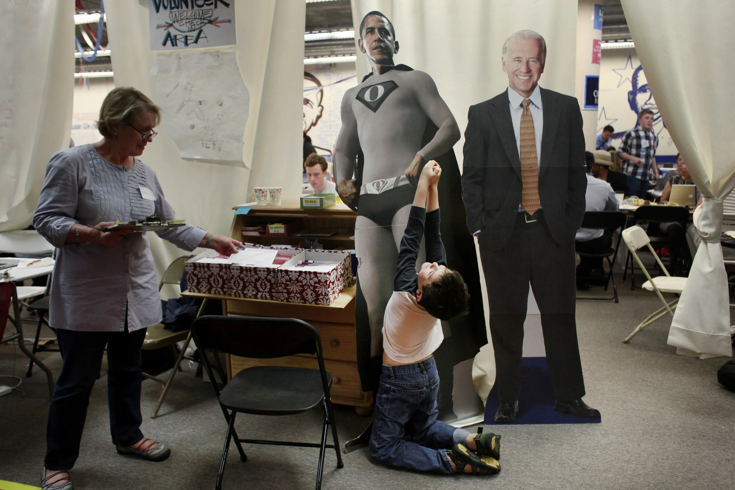  On election night, Max Benbow, 8, sends a message to President Obama at Obama Headquarters in San Francisco before the final election results spell out a second term for the president. 