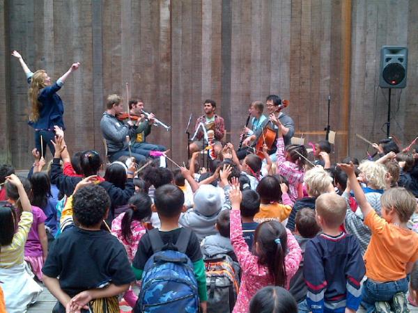 Young conductors practice on the Magik Mini Orchestra