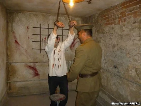 Museum employees at
the Museum of Political Oppression in Kazakhstan demonstrate how prisoners were
tortured to extract confessions. Photo by Elena Weber, RFE/RL. See the original
article for the full photo gallery here: http://www.rferl.org/content/kazakhstan-gulag-tour/24991694.html