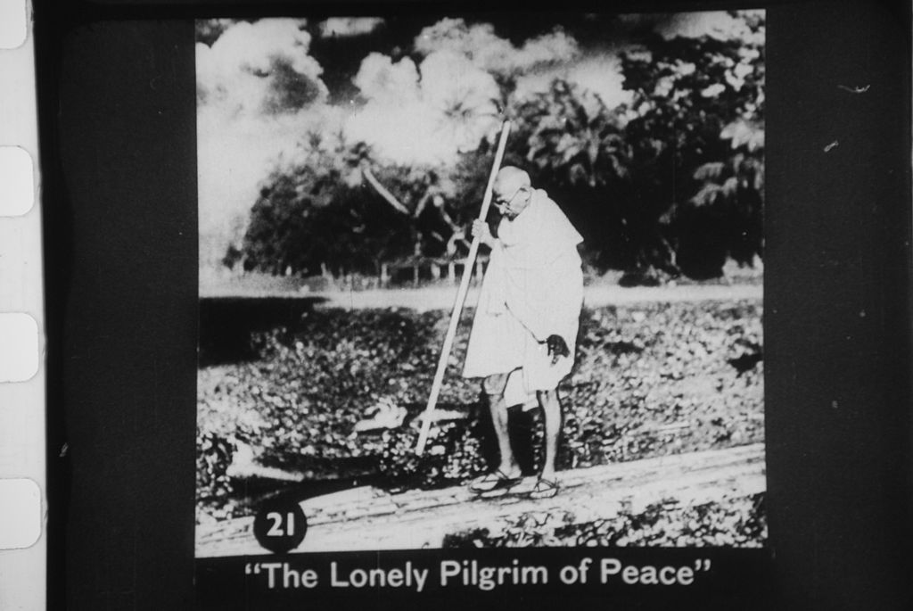 In this final image Gandhi is portrayed as the "lonely pilgrim of peace", a reference to his non-violent means for obtaining change. Alas, Gandhi was soon to suffer a violent death at the hands of Hindu Nationalist Nathuram Godse