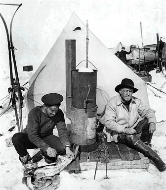 Frank Hurley and Ernest Shackleton at camp. This photograph was published in the United States in Ernest Shackleton's book, South, in 1919.