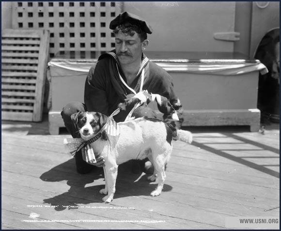 Sailor with “Mike,” mascot of USS New York , circa 1899.