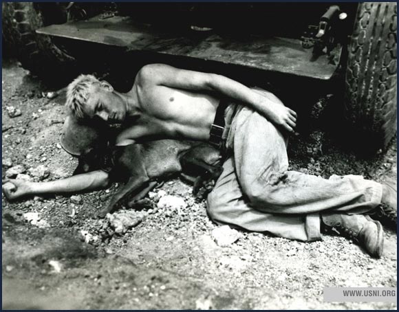 US Marine private takes a nap with his division’s mascot while on Okinawa, 1945.
Normal
0
21
false
false
false
ES-PY
X-NONE
X-NONE
/* Style Definitions */
table.MsoNormalTable
{mso-style-name:"Tabla normal";
mso-tstyle-rowband-size:0;
mso-tstyle-colband-size:0;
mso-style-noshow:yes;
mso-style-priority:99;
mso-style-qformat:yes;
mso-style-parent:"";
mso-padding-alt:0cm 5.4pt 0cm 5.4pt;
mso-para-margin:0cm;
mso-para-margin-bottom:.0001pt;
mso-pagination:widow-orphan;
font-size:11.0pt;
font-family:"Calibri","sans-serif";
mso-ascii-font-family:Calibri;
mso-ascii-theme-font:minor-latin;
mso-fareast-font-family:"Times New Roman";
mso-fareast-theme-font:minor-fareast;
mso-hansi-font-family:Calibri;
mso-hansi-theme-font:minor-latin;}