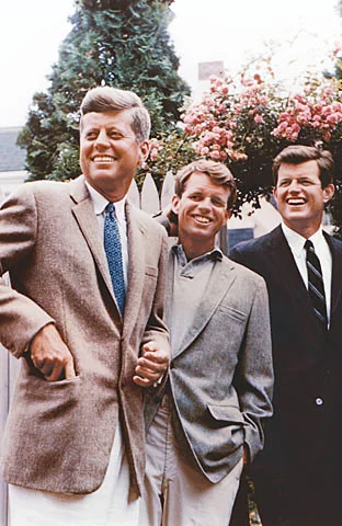 The Kennedy brothers in 1960. Robert is in the middle, with John on the left, and Ted on the right.
