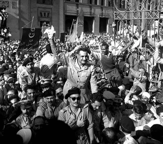 General Nasser (center of picture with hand in the air), Alexandria, Egypt, 1954.