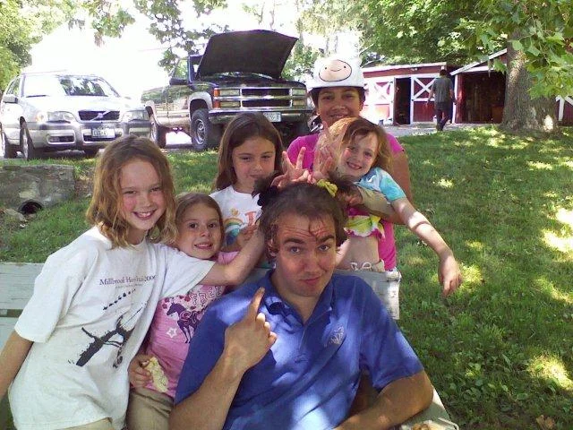 Mark lets the girls do his hair!