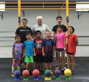Katie working with the CrossFit Kids/Teens Program